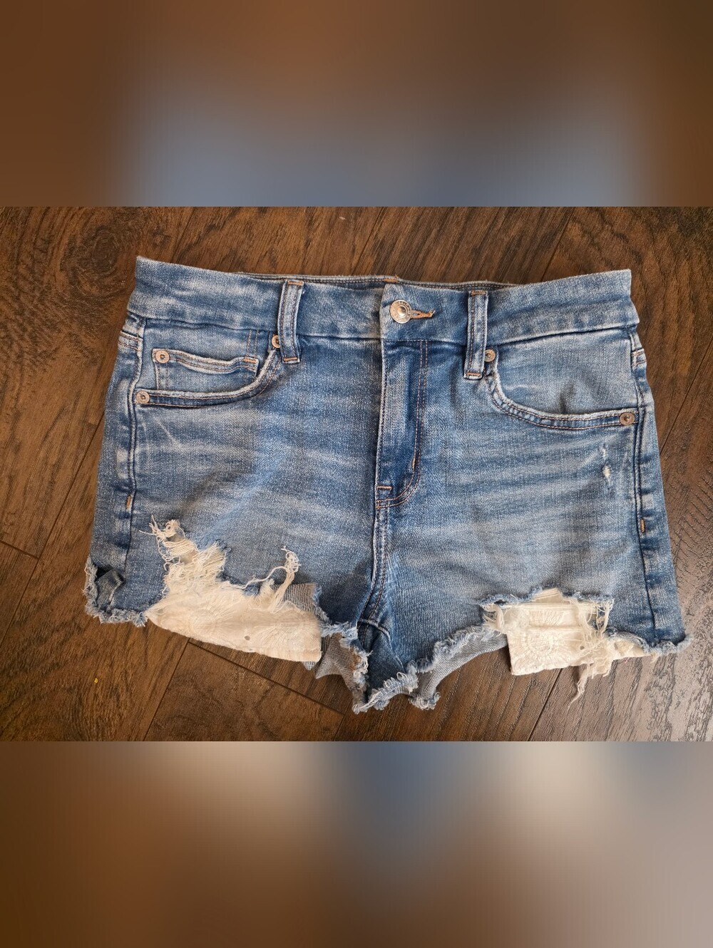 American Eagle Outfitters Light Blue Denim Jeans with Tan Stitching